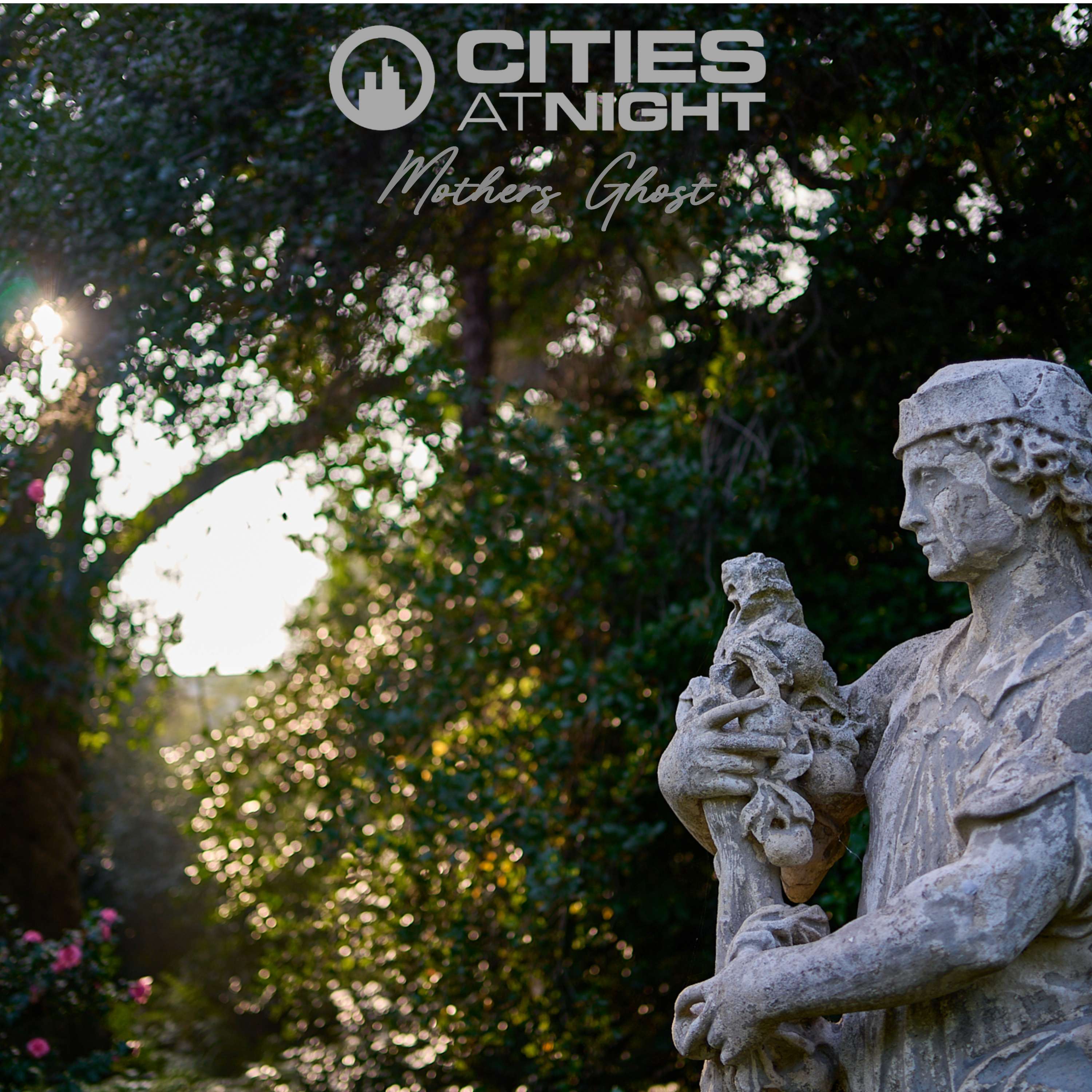 Cities at Night - Mother's Ghost: a statue in front of a tree with the words cities at night
